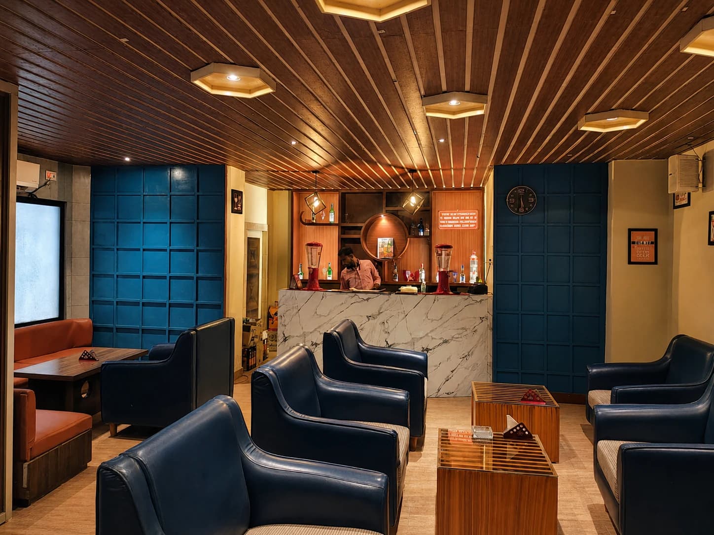 Pavillion Bar counter with curated spirits and single malt display
