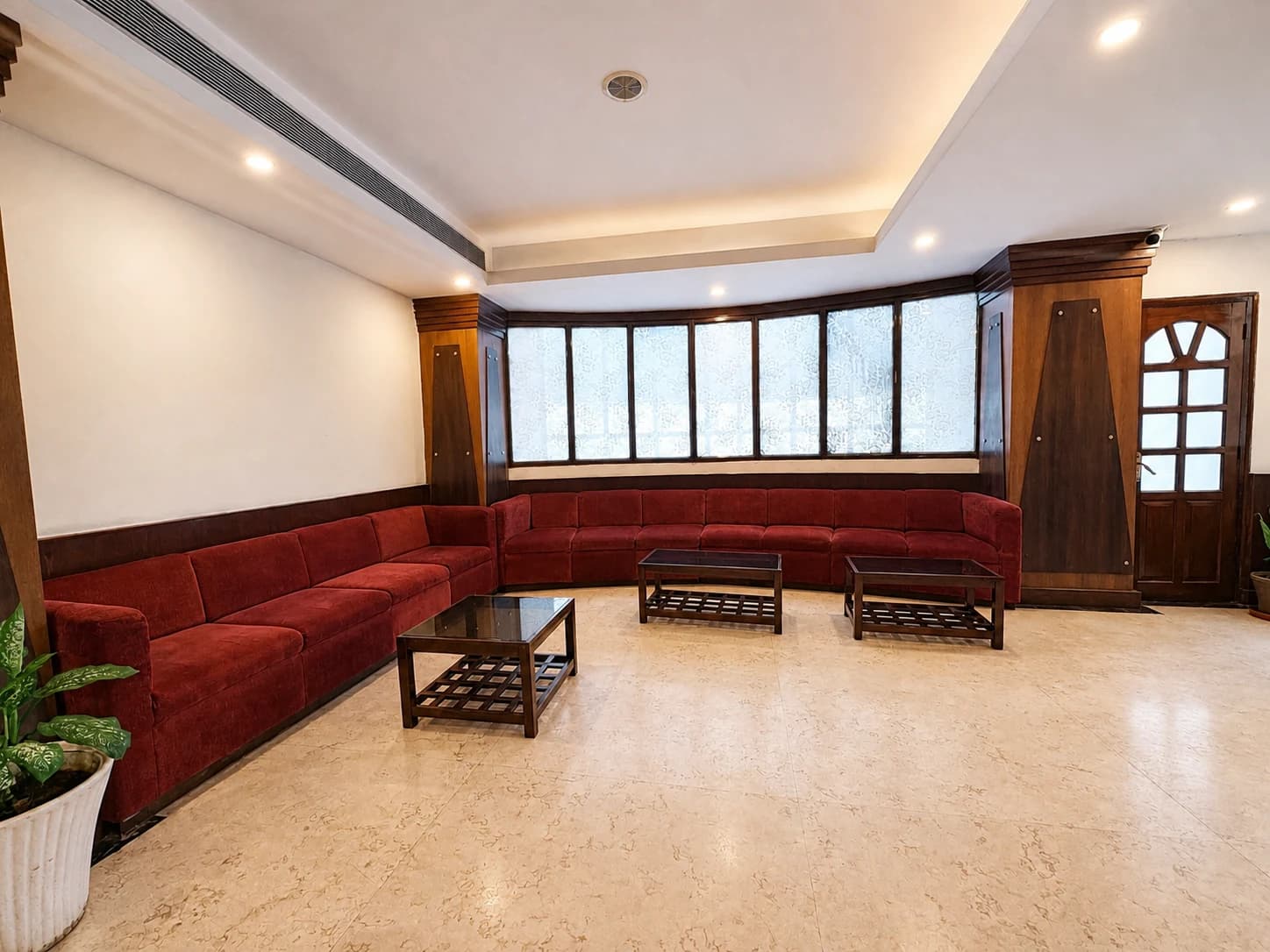 Comfortable sofa seating in the hotel reception lobby area