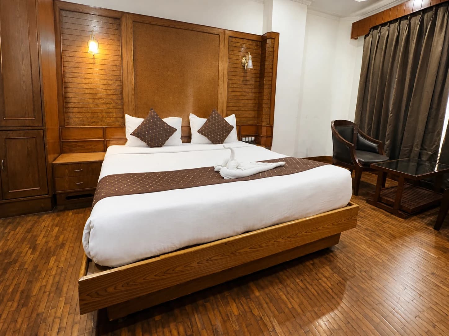 Close up of presidential suite king bed and headboard