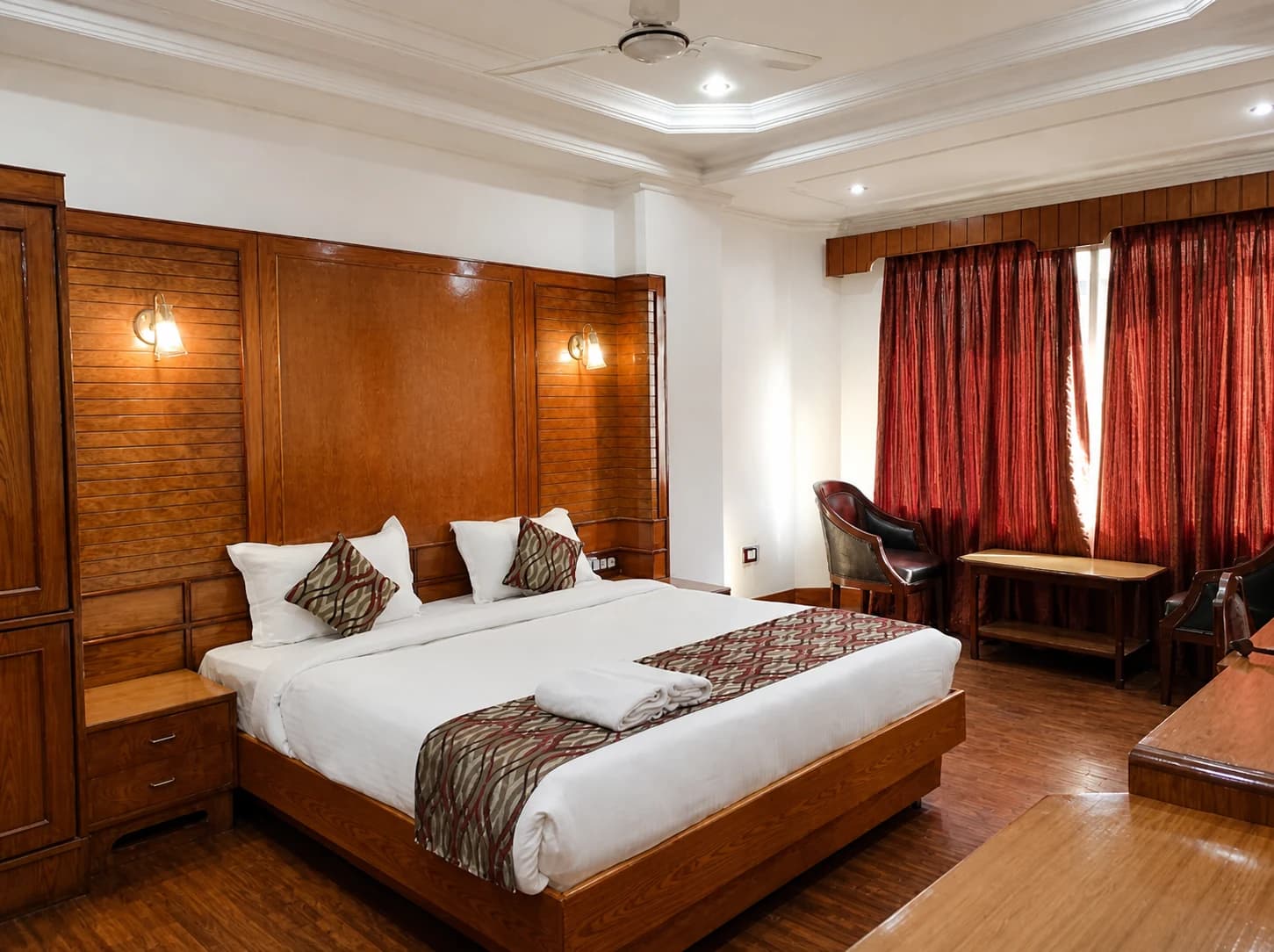 Master bedroom suite with king bed and panoramic windows